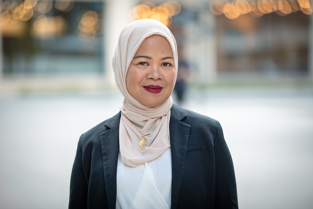 Woman in hijab smiling