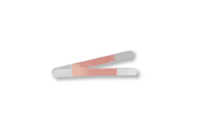 Two overlapping beige and gray pregnancy test strips on a white background.