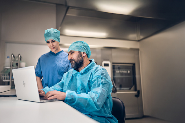 Service technician and CSSD operator in CSSD environment